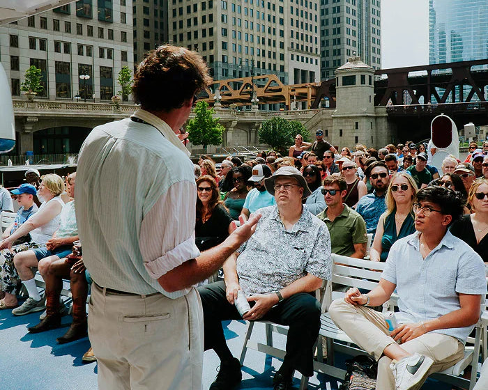 Wendella architecture tour boat cruising the Chicago River with the downtown skyline in the background