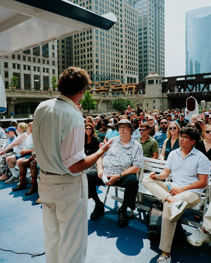 Wendella architecture tour boat cruising the Chicago River with the downtown skyline in the background