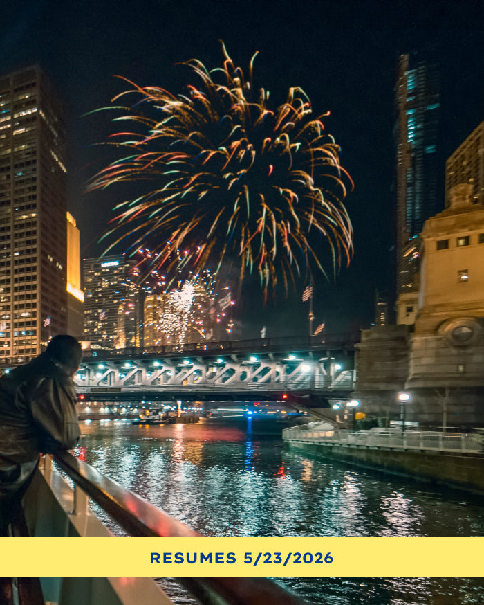 Wendella Chicago River Fireworks Cruise with fireworks reflecting off the river and skyscrapers
