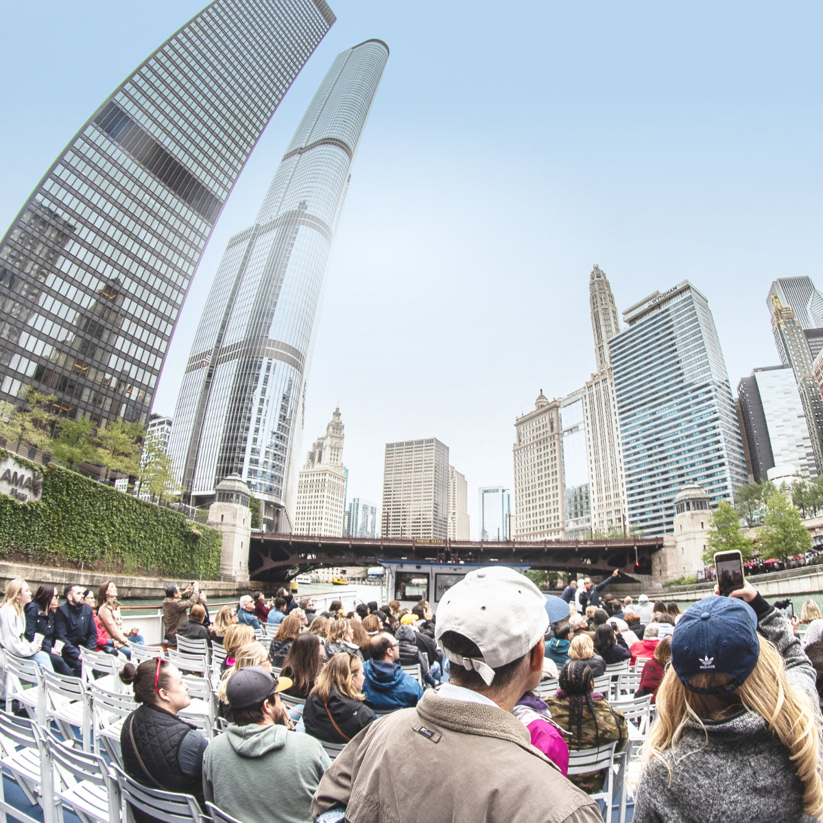 Wendella architecture tour guests on the upper deck with Chicago River and skyline views